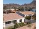 Aerial view of home with backyard and mountain views in background at 1819 E Palmaire Ave, Phoenix, AZ 85020