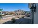 View of a street with houses, a mountain, and under construction homes at 1819 E Palmaire Ave, Phoenix, AZ 85020