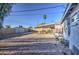 Spacious backyard with gravel, covered patio and large tree at 8836 N 28Th Dr, Phoenix, AZ 85051