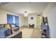 Spacious living room with tiled floors and comfortable leather seating at 8836 N 28Th Dr, Phoenix, AZ 85051