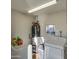 Laundry room with washer, dryer and water heater at 8836 N 28Th Dr, Phoenix, AZ 85051