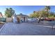 Single-story home with a gravel front yard and mature tree providing shade at 8836 N 28Th Dr, Phoenix, AZ 85051
