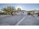 Charming single-story home with a well-maintained front yard and driveway at 8836 N 28Th Dr, Phoenix, AZ 85051