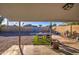 Backyard with covered patio, artificial turf and gravel at 8836 N 28Th Dr, Phoenix, AZ 85051