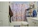 Clean bathroom with shower/tub combo, toilet and vanity at 8836 N 28Th Dr, Phoenix, AZ 85051
