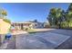 Spacious backyard with gravel, covered patio and large tree at 8836 N 28Th Dr, Phoenix, AZ 85051