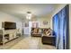 Bright living room with a view of the dining area and plenty of natural light at 8836 N 28Th Dr, Phoenix, AZ 85051