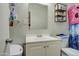 Clean bathroom with a white vanity and shower/tub combo at 8836 N 28Th Dr, Phoenix, AZ 85051