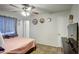 Cozy bedroom with ceiling fan and tiled floors at 8836 N 28Th Dr, Phoenix, AZ 85051