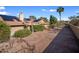 Large backyard with brick pavers and putting green at 1017 E Grandview Rd, Phoenix, AZ 85022
