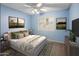 Bright bedroom with a queen-size bed and neutral decor at 1017 E Grandview Rd, Phoenix, AZ 85022