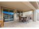 Covered patio with seating area and view of pool at 9452 E Saturn Ave, Mesa, AZ 85212