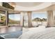 Main bedroom with stunning mountain views and private balcony access at 4636 E Moonlight Way, Paradise Valley, AZ 85253