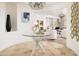 Bright entryway with glass-top table and views to living room at 4636 E Moonlight Way, Paradise Valley, AZ 85253