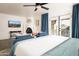 Relaxing bedroom with fireplace, sitting area, and mountain views at 4636 E Moonlight Way, Paradise Valley, AZ 85253