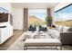 Living room with stunning mountain views and comfortable seating at 4636 E Moonlight Way, Paradise Valley, AZ 85253