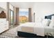 Serene bedroom with mountain views and modern decor at 4636 E Moonlight Way, Paradise Valley, AZ 85253