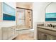 Elegant bathroom with granite vanity, soaking tub, and walk-in shower at 4636 E Moonlight Way, Paradise Valley, AZ 85253