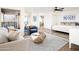 Open concept bedroom with sitting area and access to a balcony at 4636 E Moonlight Way, Paradise Valley, AZ 85253