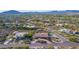Single-story home with pool and desert landscape, aerial view, mountain backdrop at 36444 N Stardust Ln, Carefree, AZ 85377