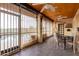 Screened patio with pool view and seating area at 36444 N Stardust Ln, Carefree, AZ 85377