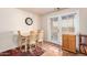 Cozy dining area with a table and chairs, near sliding doors at 36444 N Stardust Ln, Carefree, AZ 85377