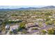Aerial view of single-story home with a pool and desert landscape at 36444 N Stardust Ln, Carefree, AZ 85377