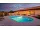 Stunning pool and patio area with desert landscape in background at 36444 N Stardust Ln, Carefree, AZ 85377