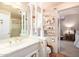 Bathroom with a vanity, toilet, shower, and shelves at 36444 N Stardust Ln, Carefree, AZ 85377