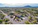Single-story home with circular driveway and desert landscaping at 36444 N Stardust Ln, Carefree, AZ 85377