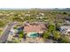 Single-story home with private pool and surrounding desert landscape; aerial view at 36444 N Stardust Ln, Carefree, AZ 85377