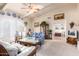 Relaxing living room with comfy seating and a ceiling fan at 36444 N Stardust Ln, Carefree, AZ 85377