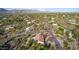 Aerial view showing a house with a pool, nestled in a desert residential community at 36444 N Stardust Ln, Carefree, AZ 85377