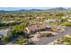 Aerial view of single-story home with pool, desert landscaping, and mountain views at 36444 N Stardust Ln, Carefree, AZ 85377