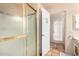 Bathroom with a shower and access to the backyard at 36444 N Stardust Ln, Carefree, AZ 85377