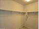 Spacious closet with double hanging rods at 10736 W Paso Trl, Peoria, AZ 85383