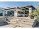 Modern outdoor kitchen with bar and grill at 4845 E Caida Del Sol Dr, Paradise Valley, AZ 85253