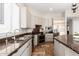 Modern kitchen featuring granite countertops and ample cabinet space at 6331 W Fullam St, Glendale, AZ 85308