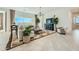 Bright and airy living room with a large window and neutral decor at 3297 E Saddletree Way, San Tan Valley, AZ 85140