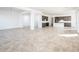 Open concept dining room with tile floors and large windows at 15435 W Bajada Dr, Surprise, AZ 85387