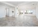 Open dining room with large windows and tile floors at 15435 W Bajada Dr, Surprise, AZ 85387