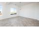 Dining area with tile floors and a chandelier at 15435 W Bajada Dr, Surprise, AZ 85387