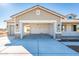 Two-car garage with ample space and open design at 15435 W Bajada Dr, Surprise, AZ 85387