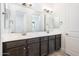 Modern bathroom boasts double vanity and updated fixtures at 15435 W Bajada Dr, Surprise, AZ 85387