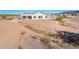 House's backyard view with desert landscape in the background at 15435 W Bajada Dr, Surprise, AZ 85387
