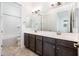 Double vanity bathroom with a bathtub and shower at 15435 W Bajada Dr, Surprise, AZ 85387