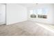 Bright bedroom featuring neutral carpeting and abundant natural light at 15435 W Bajada Dr, Surprise, AZ 85387