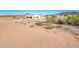 House's backyard view with desert landscape in the background at 15435 W Bajada Dr, Surprise, AZ 85387
