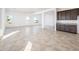 Open concept kitchen with granite countertops and dark wood cabinets at 15435 W Bajada Dr, Surprise, AZ 85387