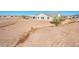 House's backyard view with desert landscape in the background at 15435 W Bajada Dr, Surprise, AZ 85387